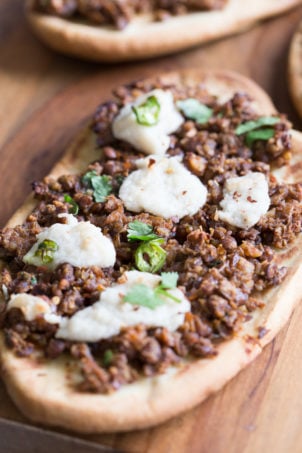 Vegan Keema Naan with Keema Lentils, onion, carrots and walnuts. These lentils with the herbs and spices make a vegan version of keema. Serve over Naan bread or Pizza or fill tacos or wraps. #Vegan #Recipe #veganricha, Can be gluten-free and soy free. | VeganRicha,com