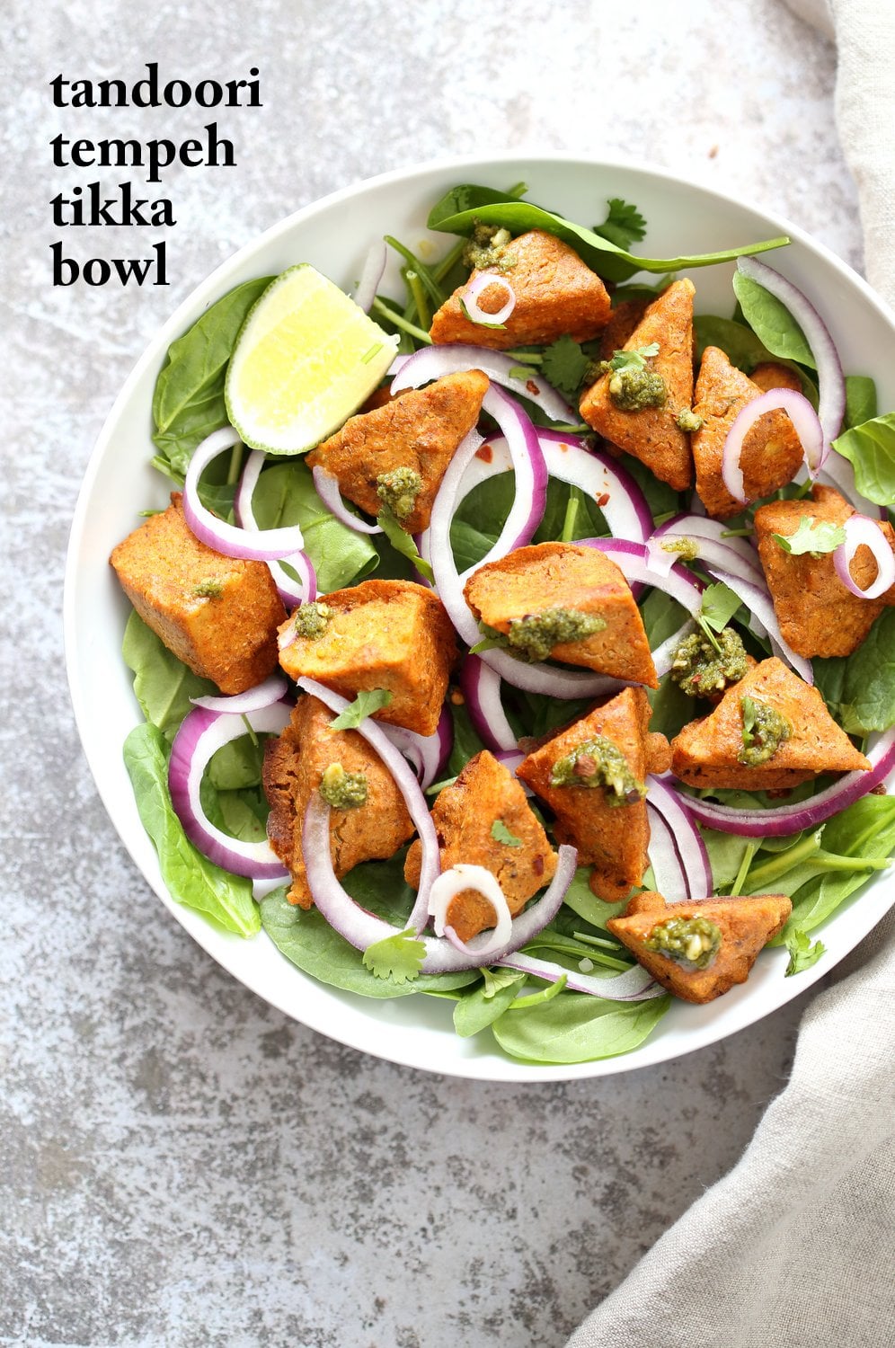 Tempeh Tandoori Tikka - Kabab Bowl with Cilantro Mint Chutney. 25 gm of Protein. Tempeh marinated in Delicious and Flavorful Tandoori Marinade, then baked and served over greens, onions. #veganricha #Vegan #Glutenfree #Recipe. Use Veggies or vegan meat subs for #soyfree | VeganRicha.com