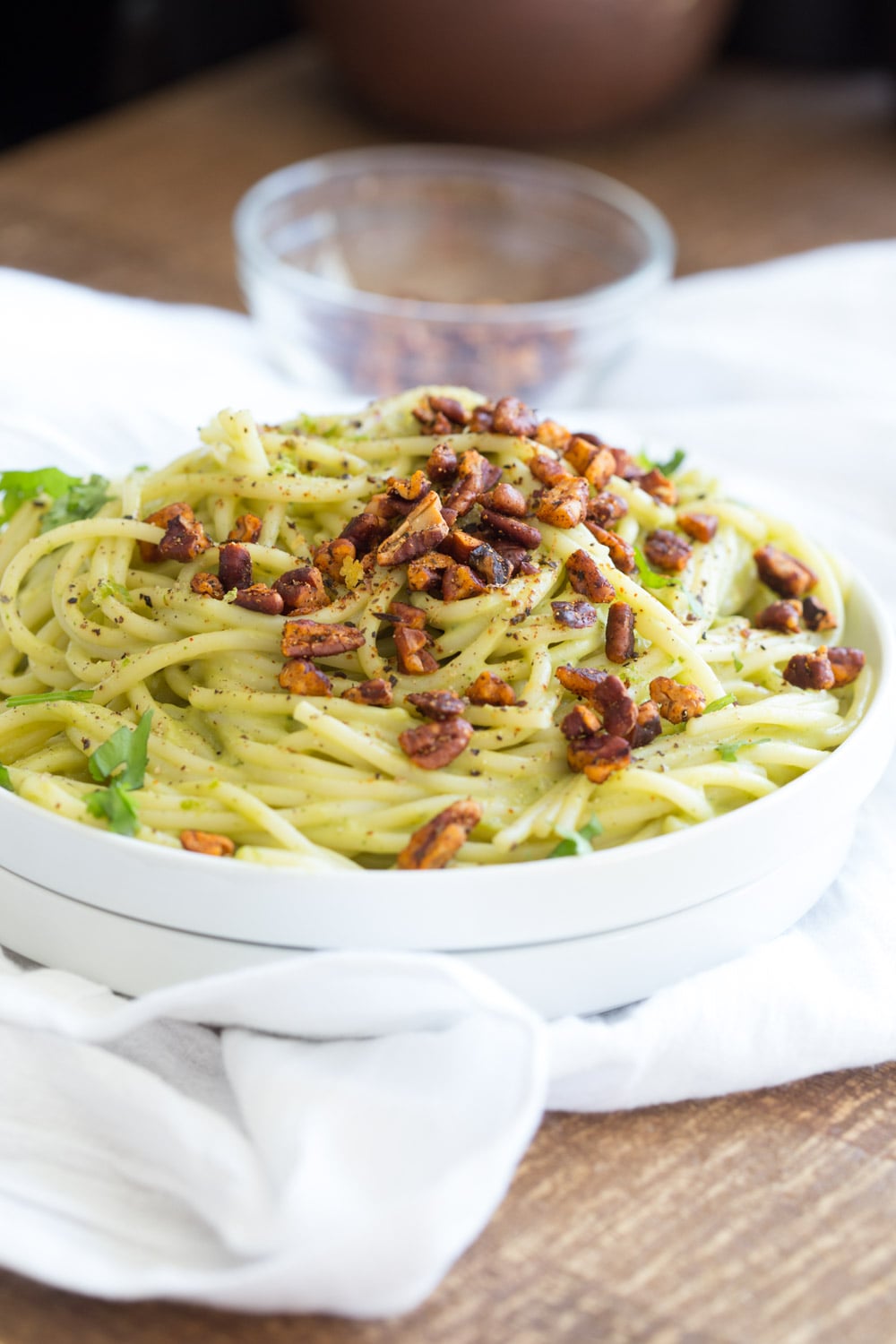 Avocado Pasta with Smoky Pecans. This 20 Minute Creamy Avocado Basil Sauce is great over spaghetti or zoodles. Serve with smoky spicy pecans for amazing flavor. #Vegan #Soyfree #Recipe. Can be #nutfree. #veganricha | VeganRicha.com