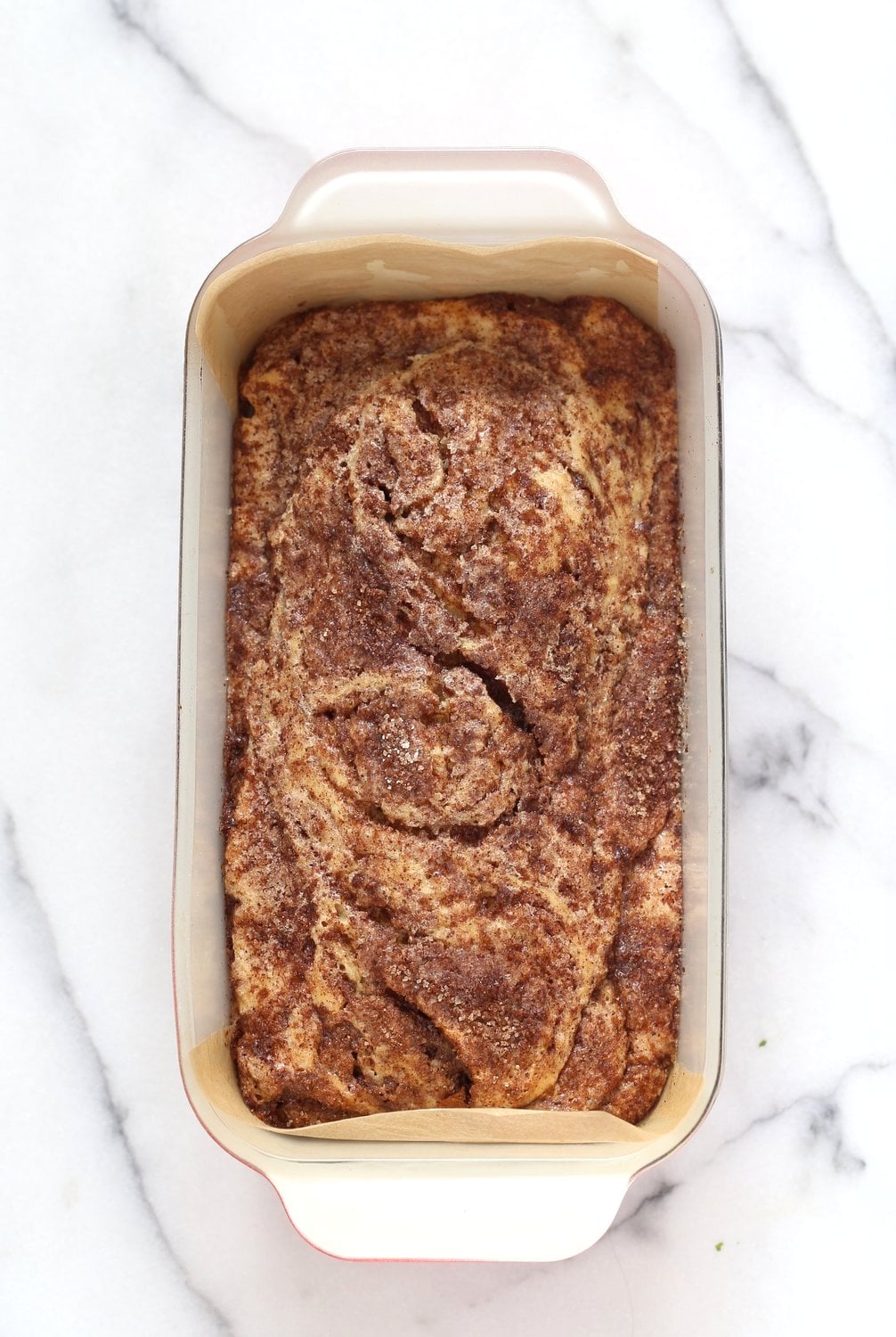 This Vegan Cinnamon Swirl Cake is super Easy and Quick. A simple yellow cake, swirled with cinnamon sugar makes for a delightful treat. Add some nuts into the swirl for variation #Vegan #Nutfree #Soyfree #Dessert #Recipe #veganricha | VeganRicha.com