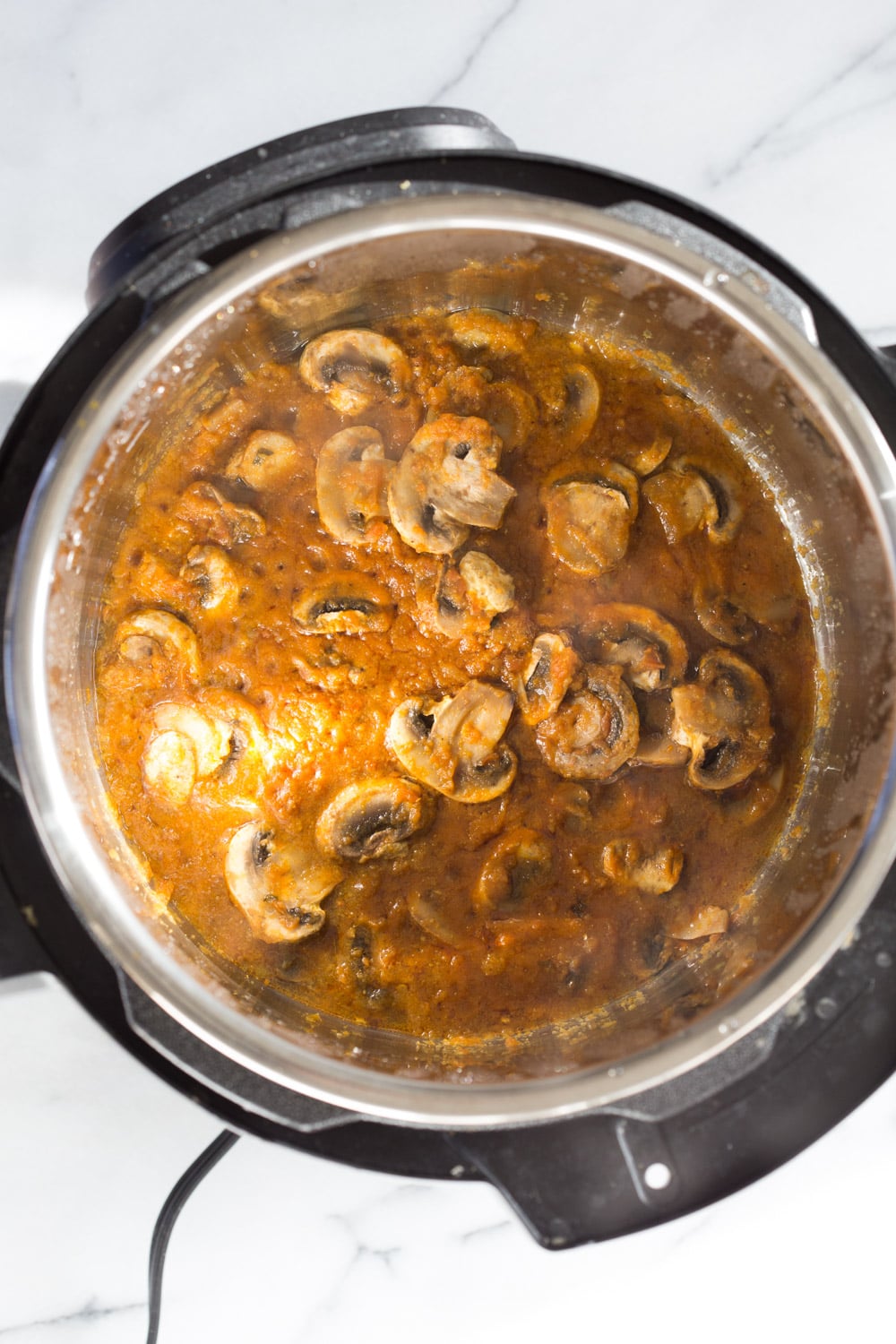 Instant Pot Mushroom Masala. Easy Mushrooms and peas in Creamy Sauce made in an Instant Pot. Add chickpeas for a hearty meal. #Vegan #Gluten-free #Soyfree #Recipe. Can be #nutfree #VeganRicha