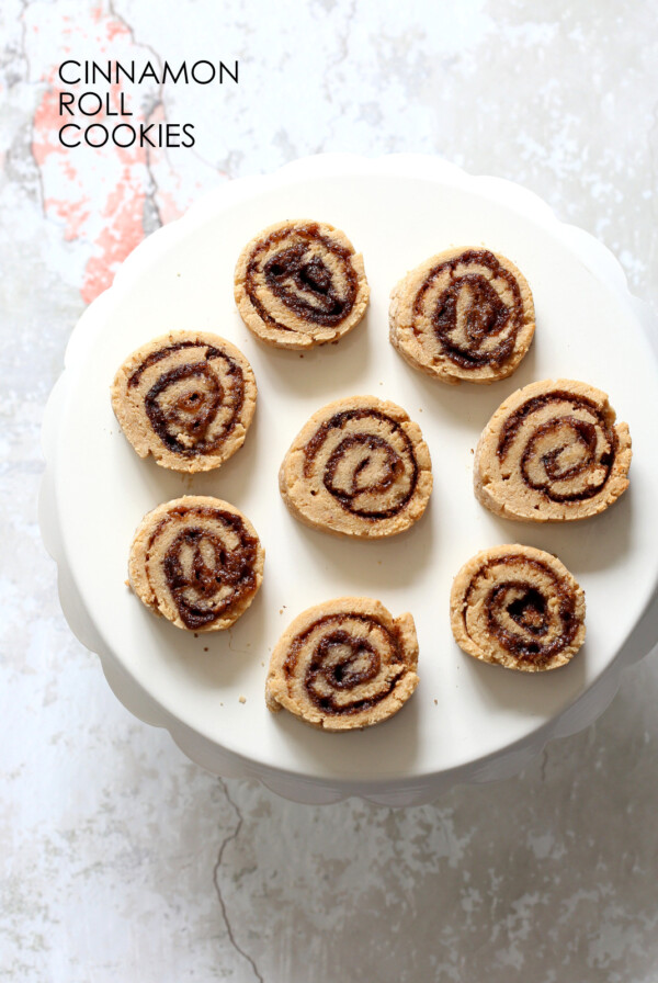 Vegan Cinnamon Roll Cookies. Soft shortbread like cookie dough dusted with cinnamon sugar, rolled, sliced and baked for cinnamon roll bites. #Vegan #Soyfree #VeganRicha #Recipe.Â
