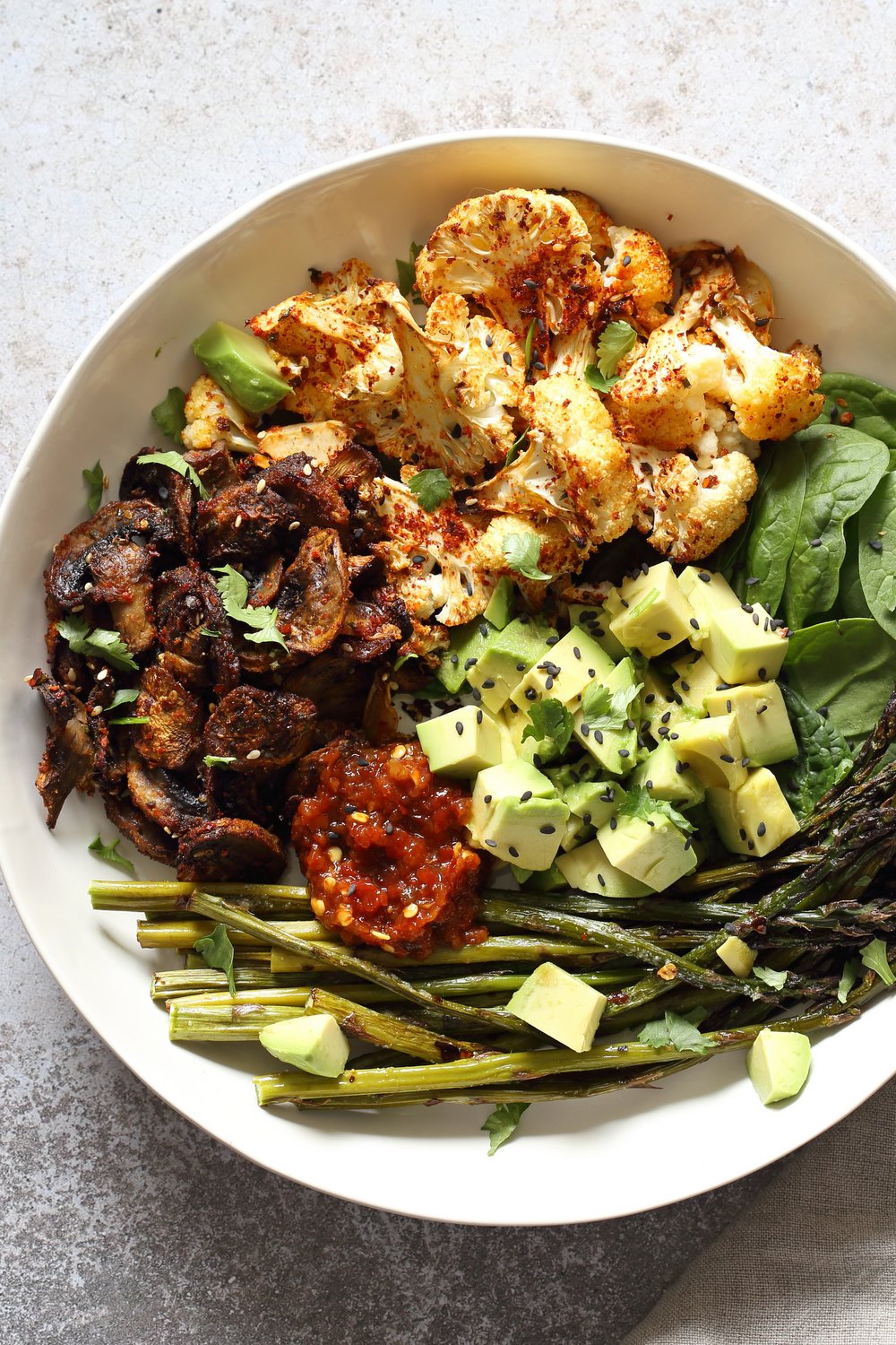 Bulgogi Roasted Spring Veggie Bowl. Spicy, sweet Korean Gochugaru blend roasted Cauliflower Mushroom Asparagus Bowl. #Vegan #Glutenfree #Nutfree #Recipe #VeganRicha | VeganRicha.com