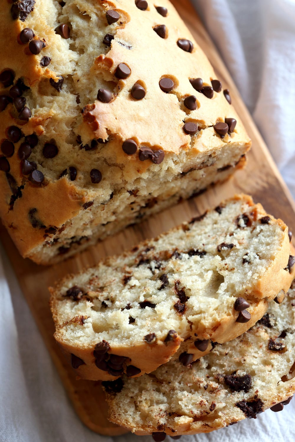 Top shot of Vegan Chocolate Chip Cake over wood board