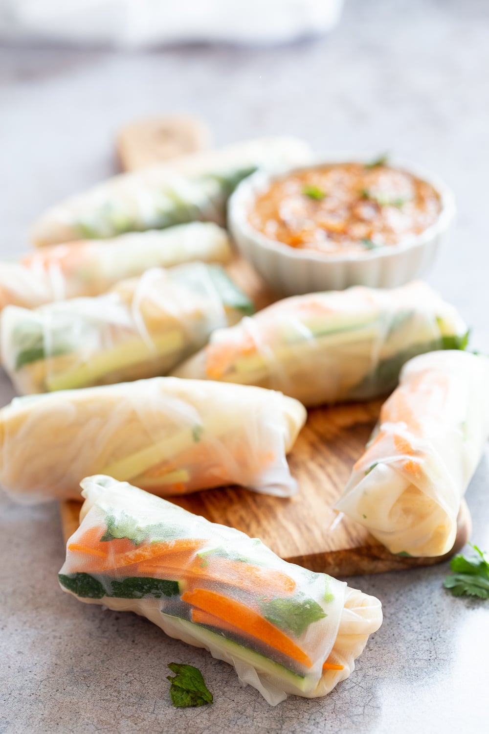 Easy Vegan Fresh Spring Rolls with Peanut Sauce. Rice paper Fresh Rolls with Marinated Tofu and Quick Peanut Dipping Sauce. #Vegan #VeganRicha #VeganSpringrolls #VeganSummerrolls Glutenfree #Recipe Can be Nutfree with Sunbutter or Sweet Chili sauce.
