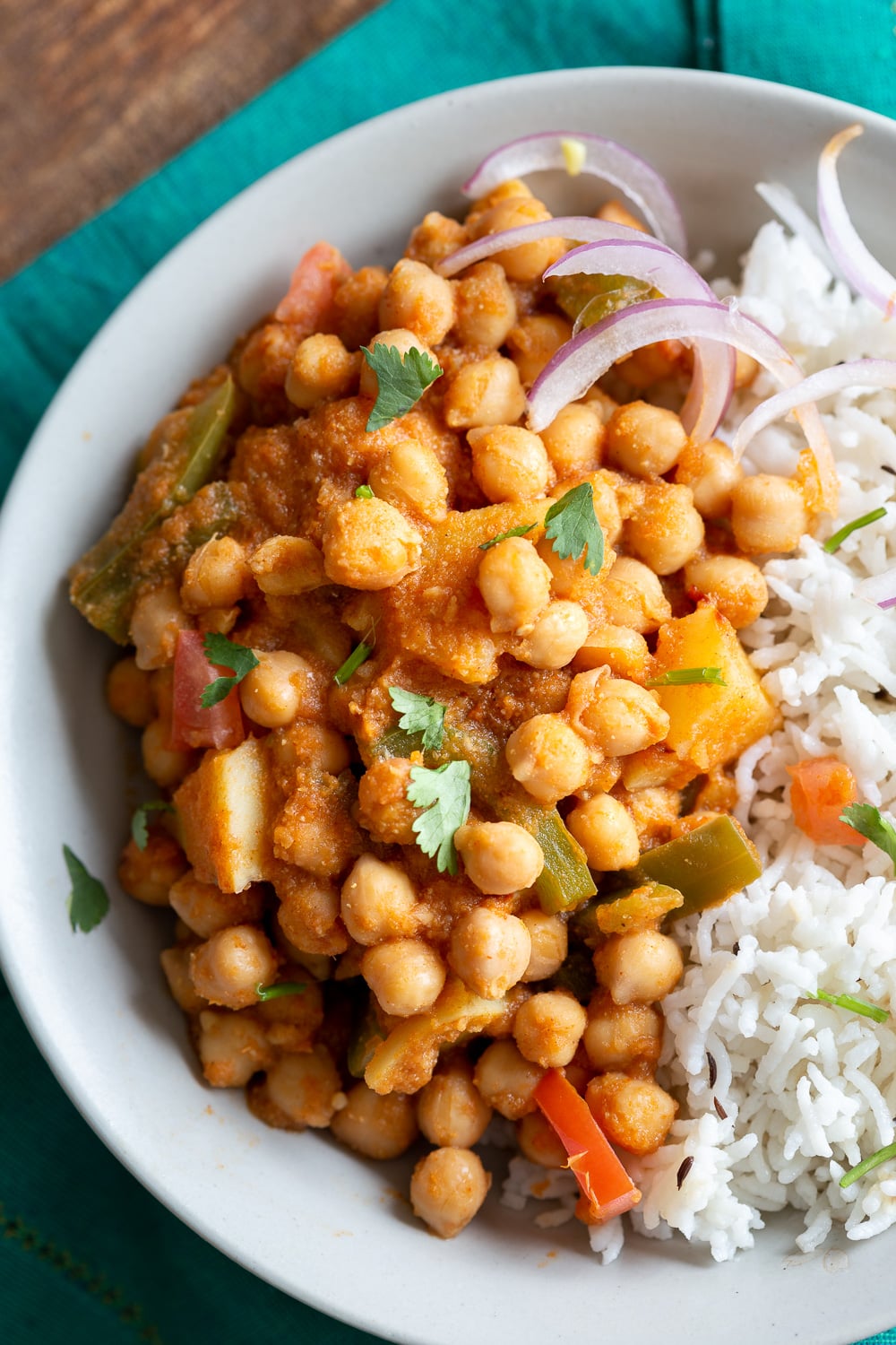 Kadai Chole is a delicious Chickpea curry generally made in wok. 1 Pot 30 min Spiced Chickpeas and Potatoes. Simple Indian sauce paired here with potatoes. #Vegan #Indian #Glutenfree #Soyfree #Nutfree #Recipe #indianvegan #VeganRicha