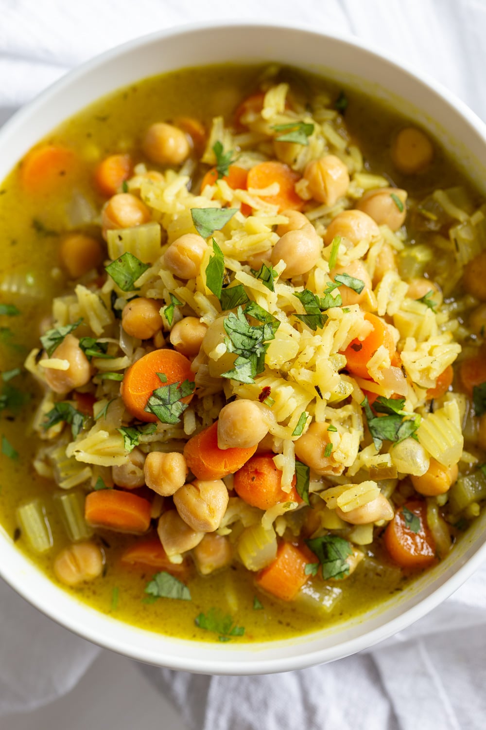 Vegan Chickpea Rice Soup in a White Bowl