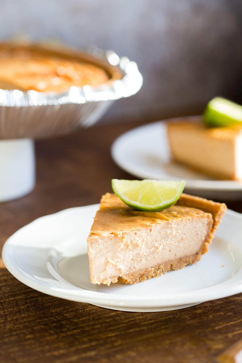 Baked Vegan Cheesecake. 8 Ingredients, no refined sugar. No prep and soaking needed. Perfectly creamy Date sweetened Cheesecake with Cashew butter. Easily Glutenfree with a glutenfree crust. #Vegan #Soyfree #Recipe #VeganRicha #cheesecake #vegancheesecake