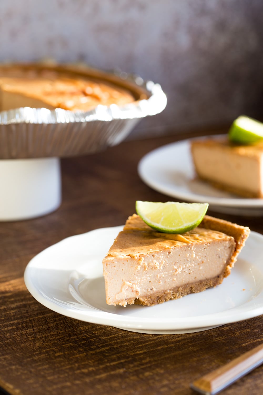 Baked Vegan Cheesecake. 8 Ingredients, no refined sugar. No prep and soaking needed. Perfectly creamy Date sweetened Cheesecake with Cashew butter. Easily Glutenfree with a glutenfree crust. #Vegan #Soyfree #Recipe #VeganRicha #cheesecake #vegancheesecake