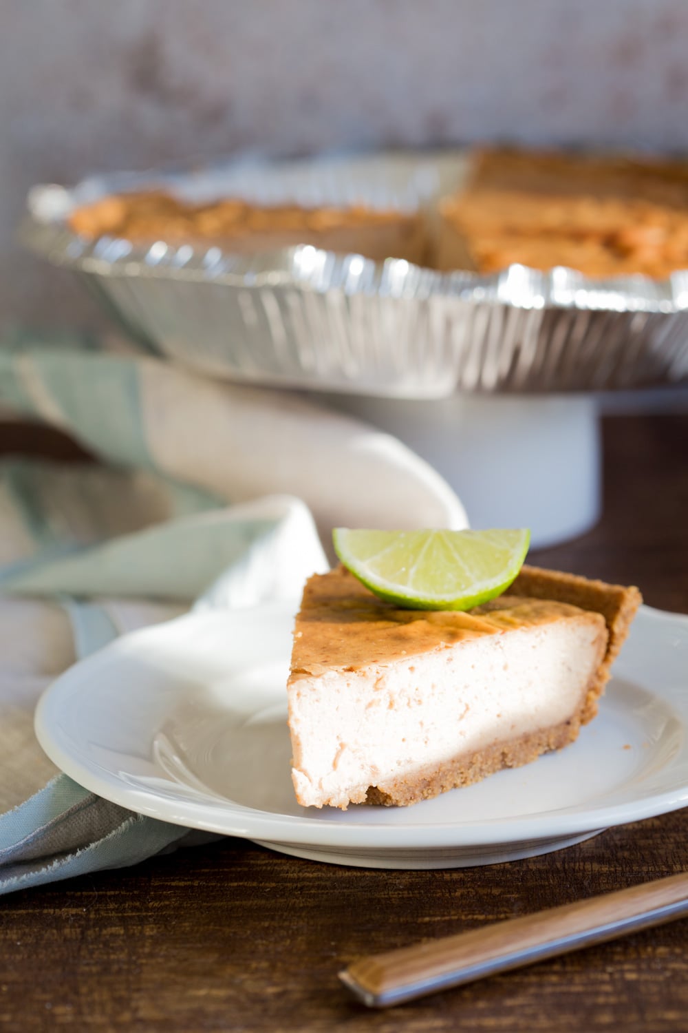 Baked Vegan Cheesecake. 8 Ingredients, no refined sugar. No prep and soaking needed. Perfectly creamy Date sweetened Cheesecake with Cashew butter. Easily Glutenfree with a glutenfree crust. #Vegan #Soyfree #Recipe #VeganRicha #cheesecake #vegancheesecake