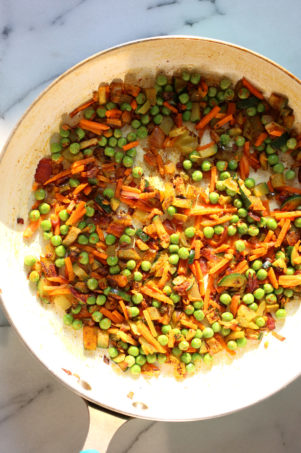 This Curry Fried Rice is packed full of flavor. Easy to make and gluten free. Use other cooked grains, spice blends for variation. A perfect side or a light meal. #vegan #Glutenfree #Soyfree #Nutfree #Recipe #veganricha