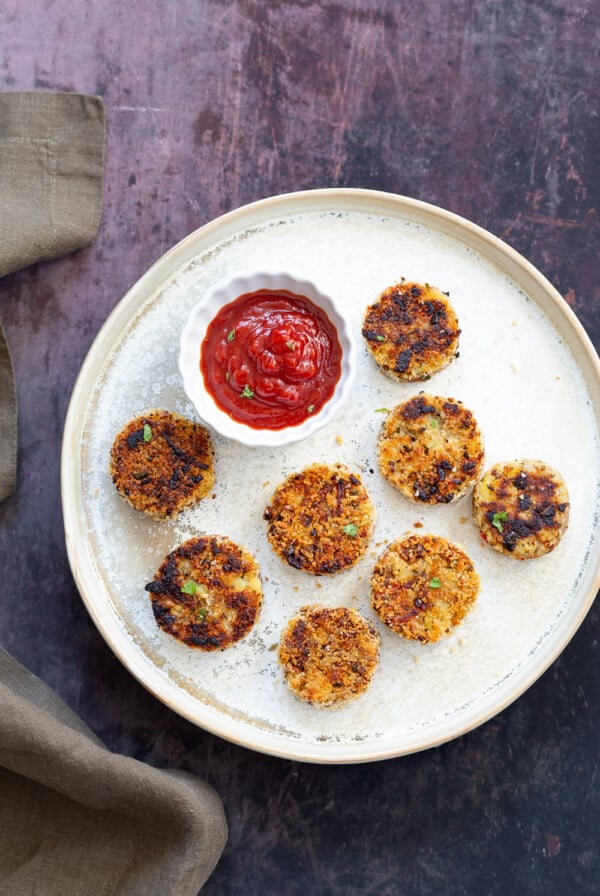 Potato Cauliflower Patties Vegan Recipe. Easy Cauliflower croquettes, pan fried or baked. #Vegan #Soyfree #Nutfree #VeganRicha #Recipe . Can be glutenfreeย | VeganRicha.com