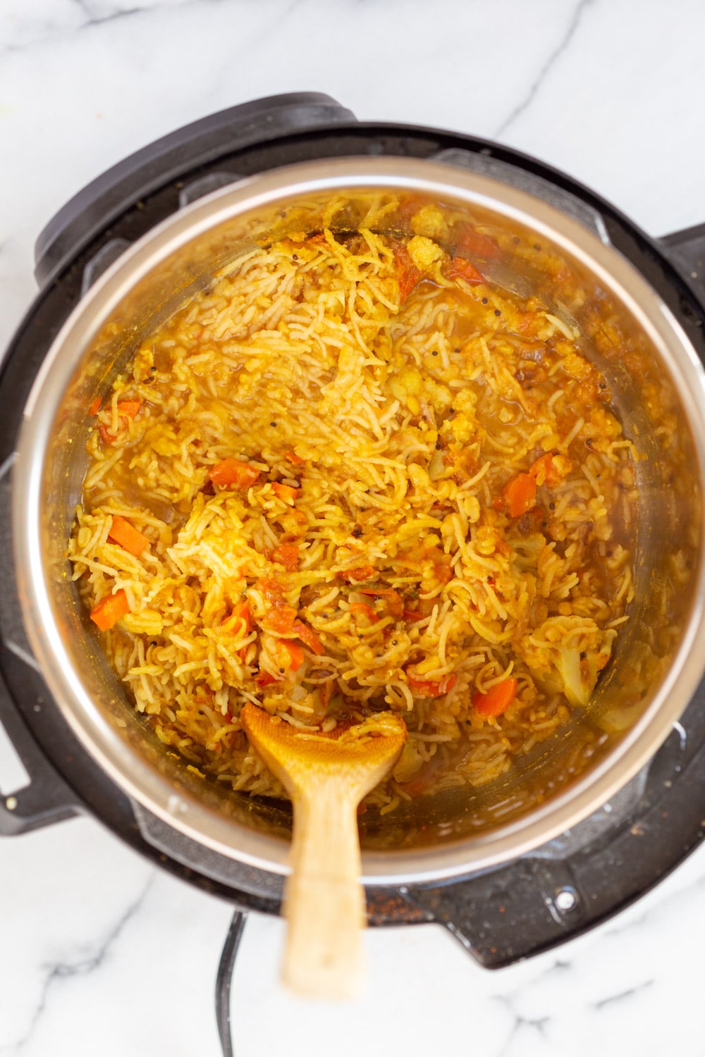 Instant Pot Kitchari Kitchari simmering in an Instant Pot