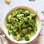 Sesame Garlic Broccoli needs just 6 ingredients. It is vibrant with blanched broccoli and delicious with a simple dressing of garlic roasted with sesame oil. A perfect side. #Vegan #glutenfree #soyfree #nutfree #veganricha #recipe 