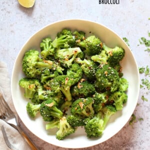 Sesame Garlic Broccoli needs just 6 ingredients. It is vibrant with blanched broccoli and delicious with a simple dressing of garlic roasted with sesame oil. A perfect side. #Vegan #glutenfree #soyfree #nutfree #veganricha #recipeĀ