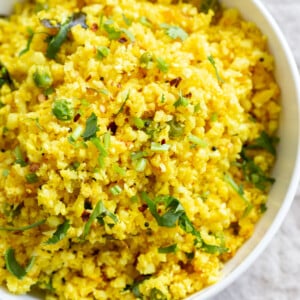 Lemony Turmeric Cauliflower Rice. Easy Side with any meal. 1 Pot Lemon Cauliflower Rice with mustard seeds and garlic. #Vegan #Glutenfree #Grainfree #Nutfree #Recipe #Turmeric #cauliflowerrice #veganrucha