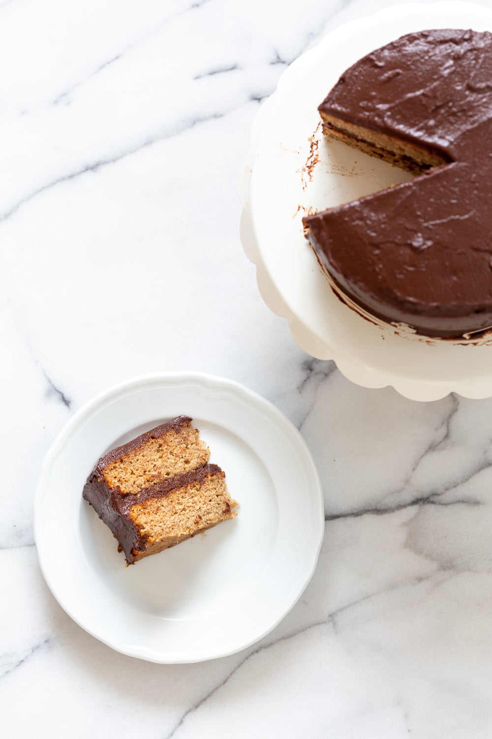Vegan Gluten free Vanilla Cake slice on marble