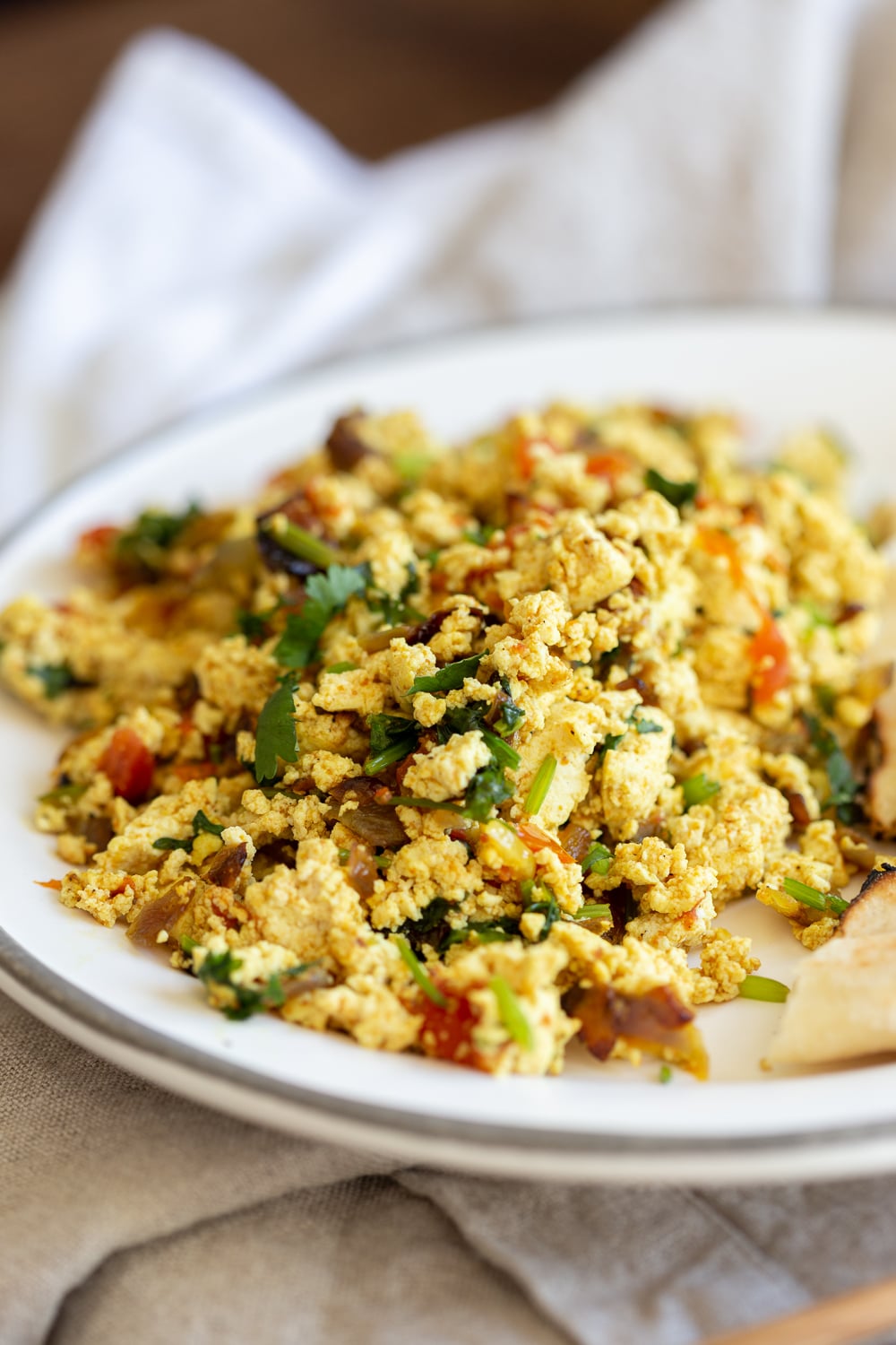 Our Vegan Tofu Bhurji in a white plate with border