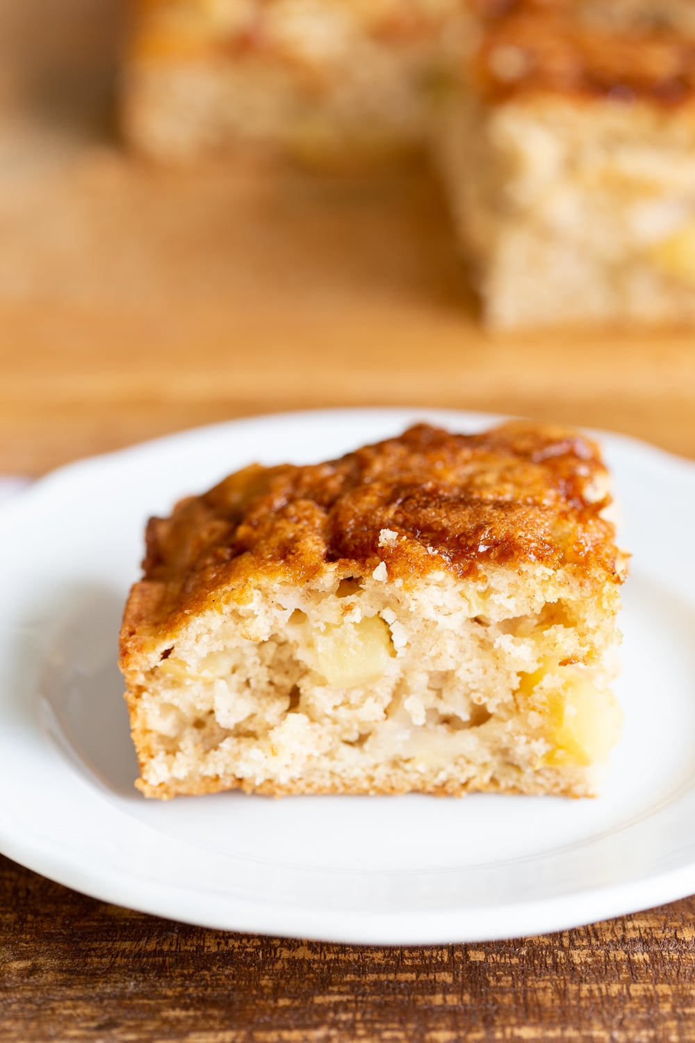 Vegan Apple Cake with Cinnamon Custard. Easy Apple Cake that is soft and light. Served with a creamy vegan vanilla custard.#VEgan #VeganRicha #VeganAppleCake #Soyfree #Recipe Nut-free Gluten-free Options
