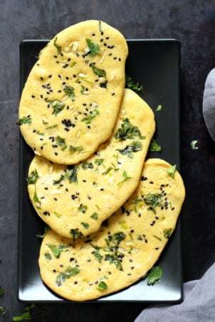 Vegan Gluten free Naan Flatbread. Grain-free Naan Recipe. 6 Main Ingredients,ย 1 Bowl, and 20 Minutes. Serve with curries or slice and serve with dips or add to bowls. Soyfree Nutfree options #Vegan #Glutenfree #grainfree #Veganricha #glutenfreenaan #grainfreenaan #chickpeaflournaan