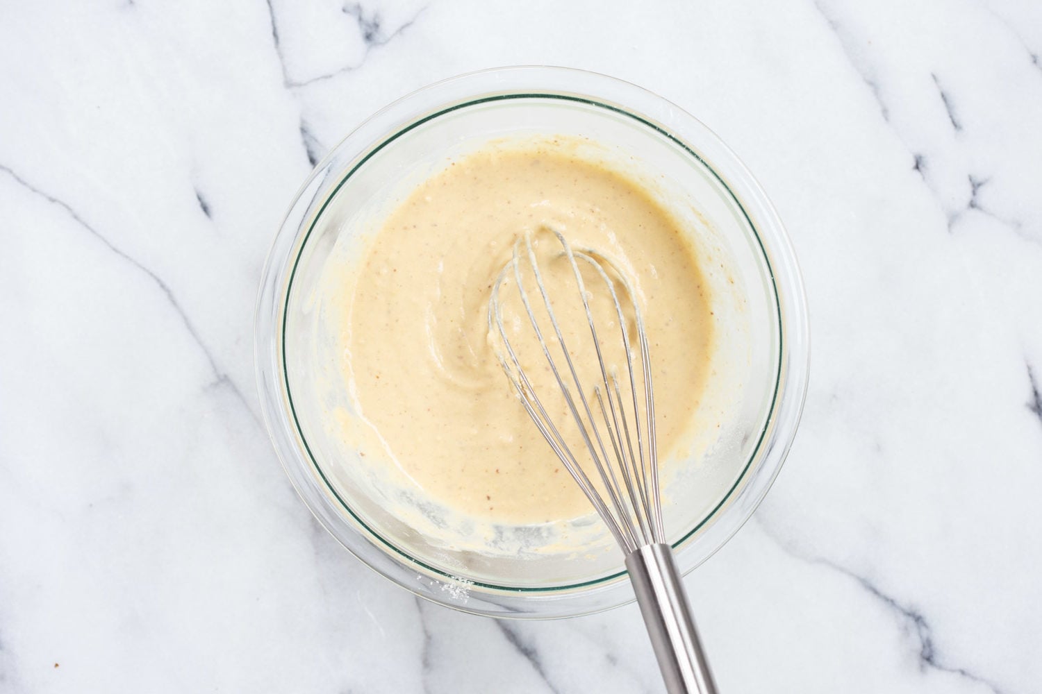 Batter for our Vegan Gluten Free Naan in a Bowl over marble