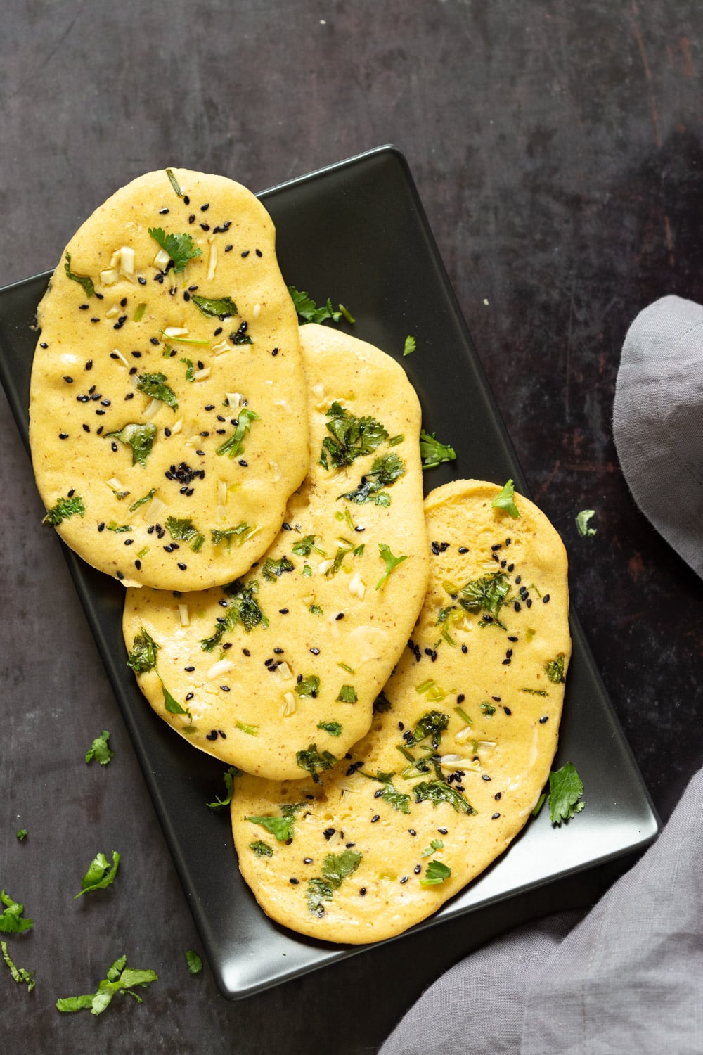 Vegan Gluten Free Naan on a Black serving board
