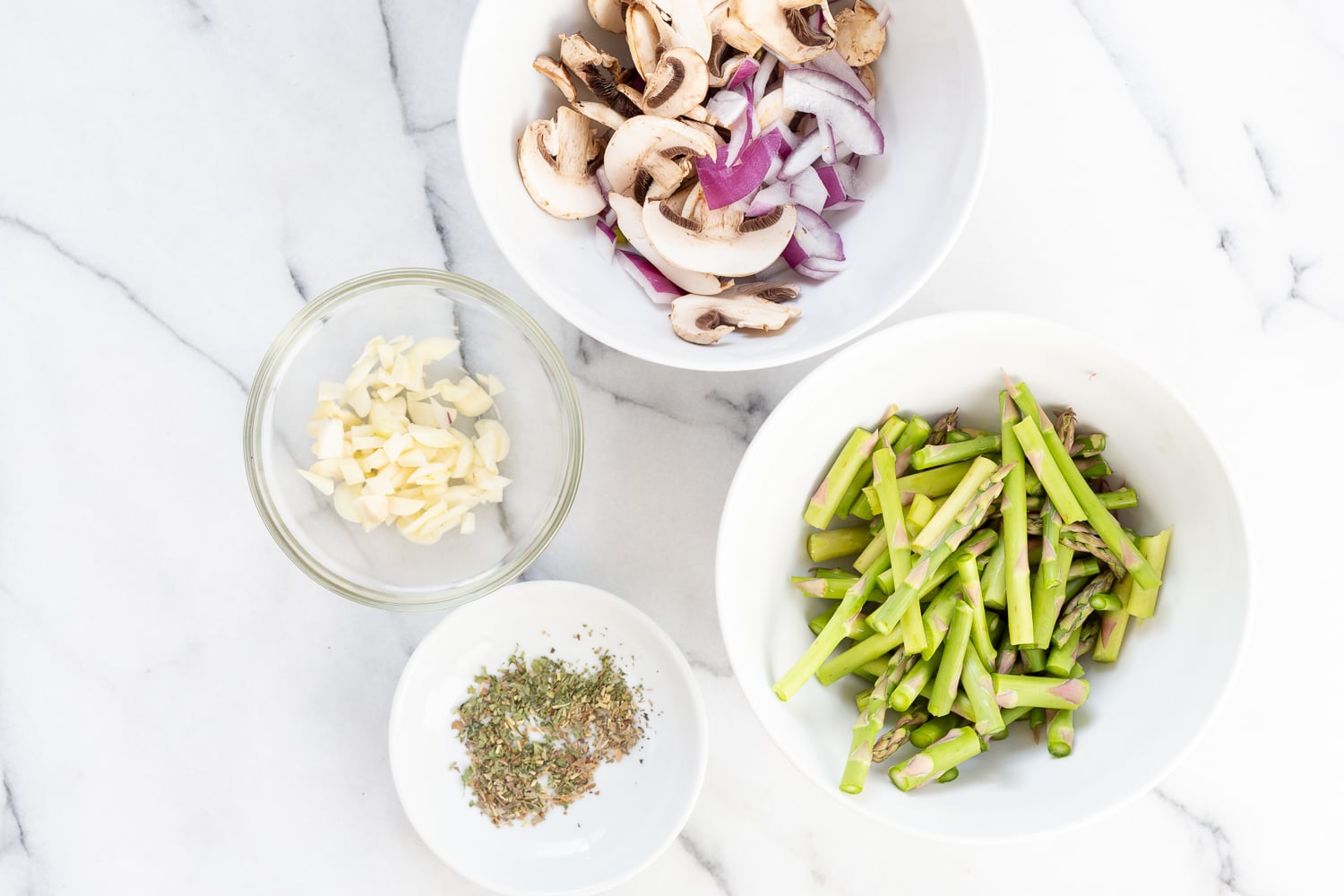 Ingredients in bowls for our Vegan Lemon Asparagus Pasta