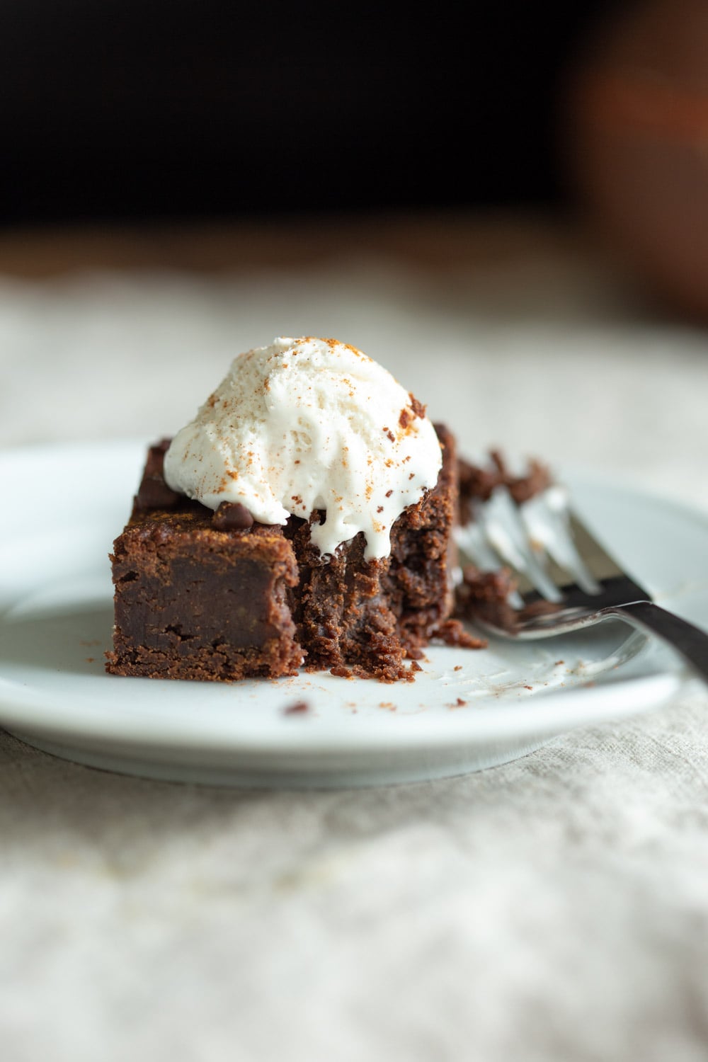 Slice of our Vegan Chickpea Brownies on a white plate