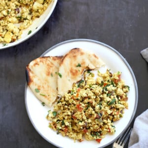 Tofu Bhurji - Vegan Bhurji or Akoori . Indian Scrambled eggs. Tofu scrambled with onion, tomato, cilantro and cumin for a delicious Eggless Bhurji Scramble Breakfast. #Vegan #Glutenfree #Nutfree #Recipe #VeganRicha #indianRecipe #tofuburji Can be soyfree.