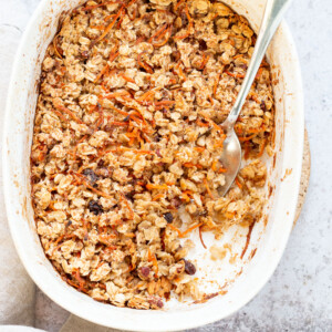 This Vegan Carrot Cake Baked Oatmeal has roasted carrots,, spices, nuts, dates and Oats! Crisp on the outside and spiced, delicious carrot cake like inside. #Vegan #Soyfree #Recipe #VeganRicha #carrotcakeoatmeal #carrotcakebakedoatmeal Easily nutfree, #glutenfree