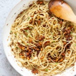 Our Vegan Cacio De Pepe with Smoky Chickpea Tofu Bits in a while skillet
