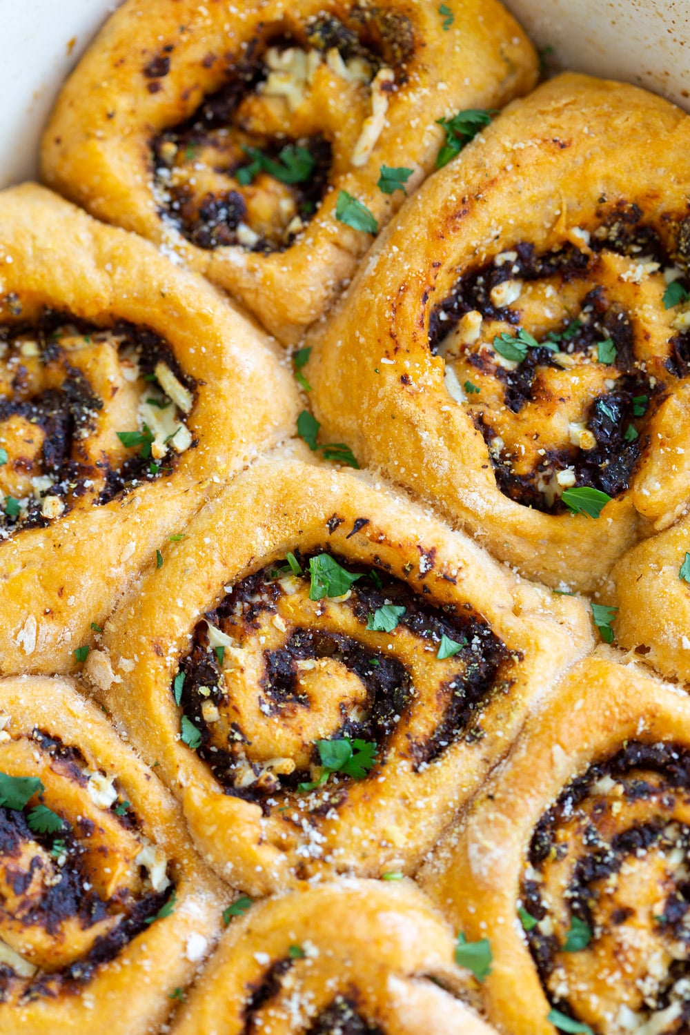 Vegan Pizza Rolls. Easy Pizza dough stuffed with herbed mushroom tomato filling, rolled, sliced and baked. Delicious snack or appetizer! #Vegan #Soyfree #Nutfree #Recipe #Veganpizzarolls #VeganRicha 
