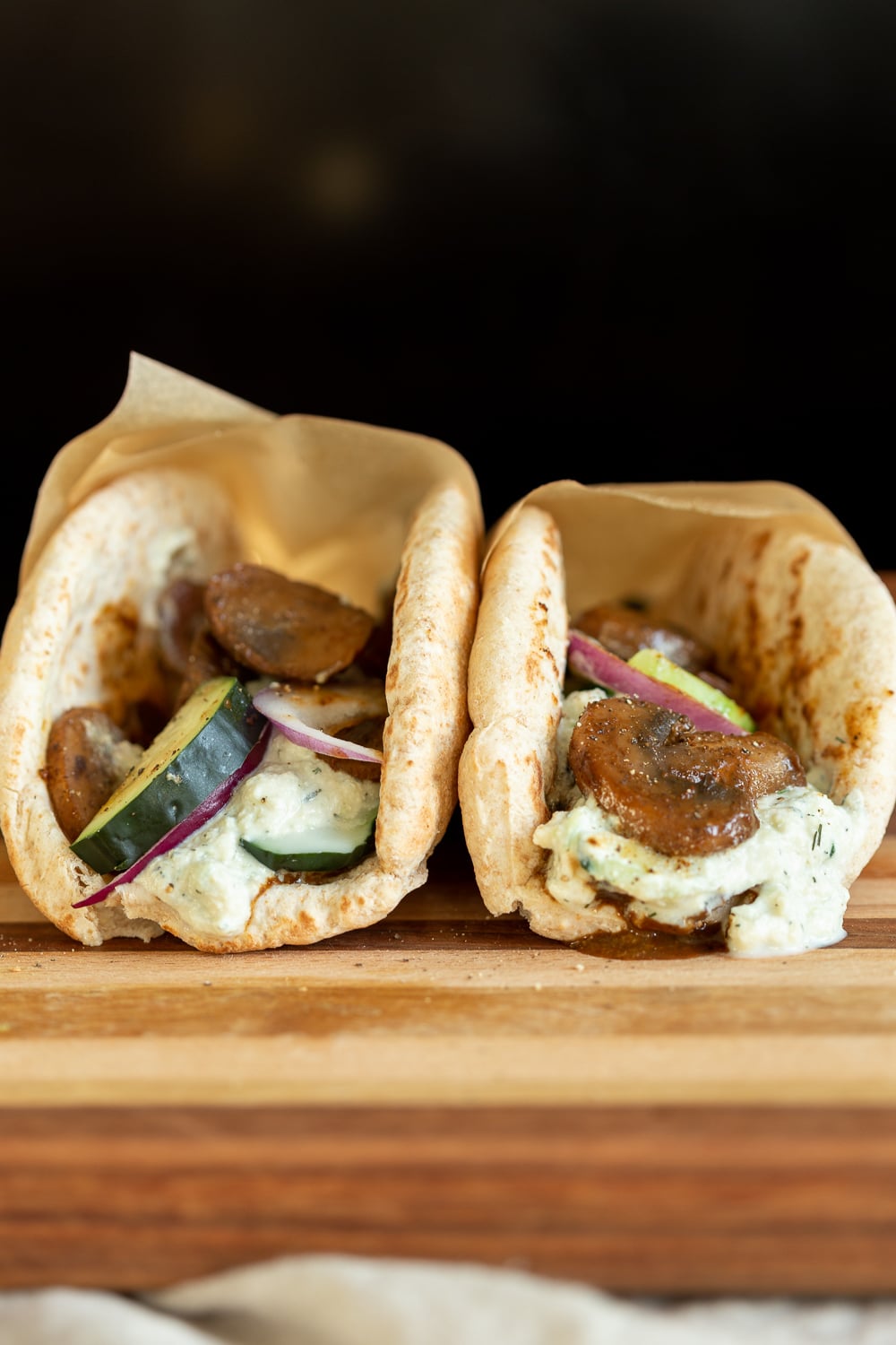 Vegan Gyros with mushrooms on wood board