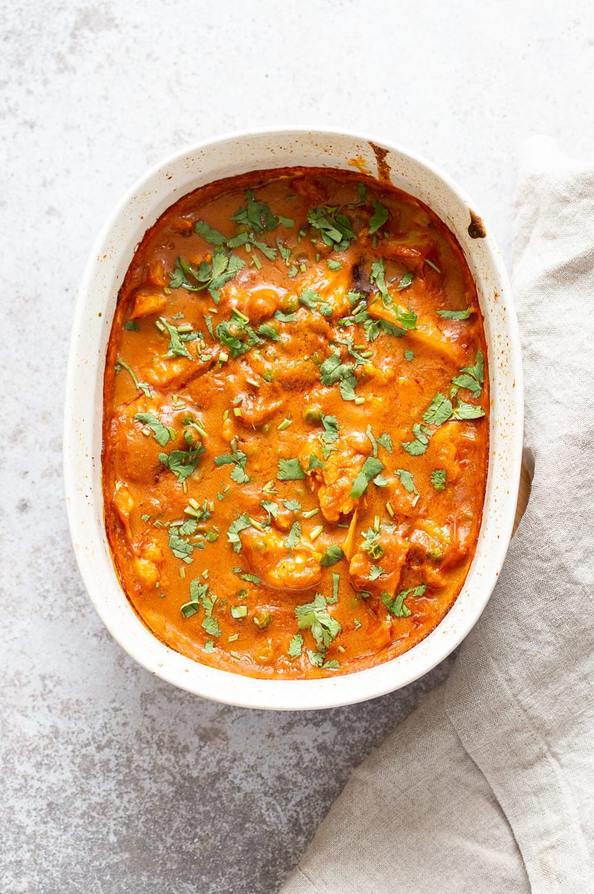 Vegan Cauliflower Pea Curry - 1 Pot Gobi Matar masala. This cauliflower peas curry gets baked in the oven. Creamy roasted flavors without standing around roasting the sauce. #Vegan #Glutenfree #Nutfree #Soyfree #Recipe #VeganRicha #gobimatar #cauliflowerpeacurry . Add some cooked chickpeas to make a meal