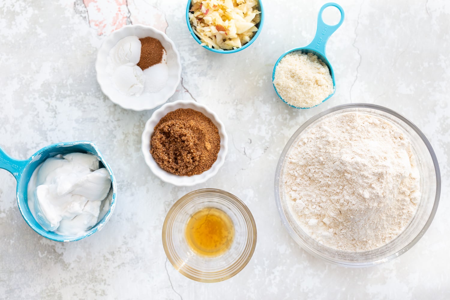 Ingredients for our Vegan Churro Scones in bowls and measuring cups
