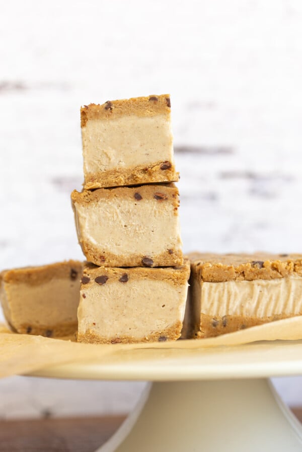 These Vegan Cookie Dough Ice Cream Sandwiches use a quick oat flour cookie dough with coconut milk vanilla ice cream base all homemade. No Baking, no ice cream machine needed. Glutenfree Soyfree Recipe.Â