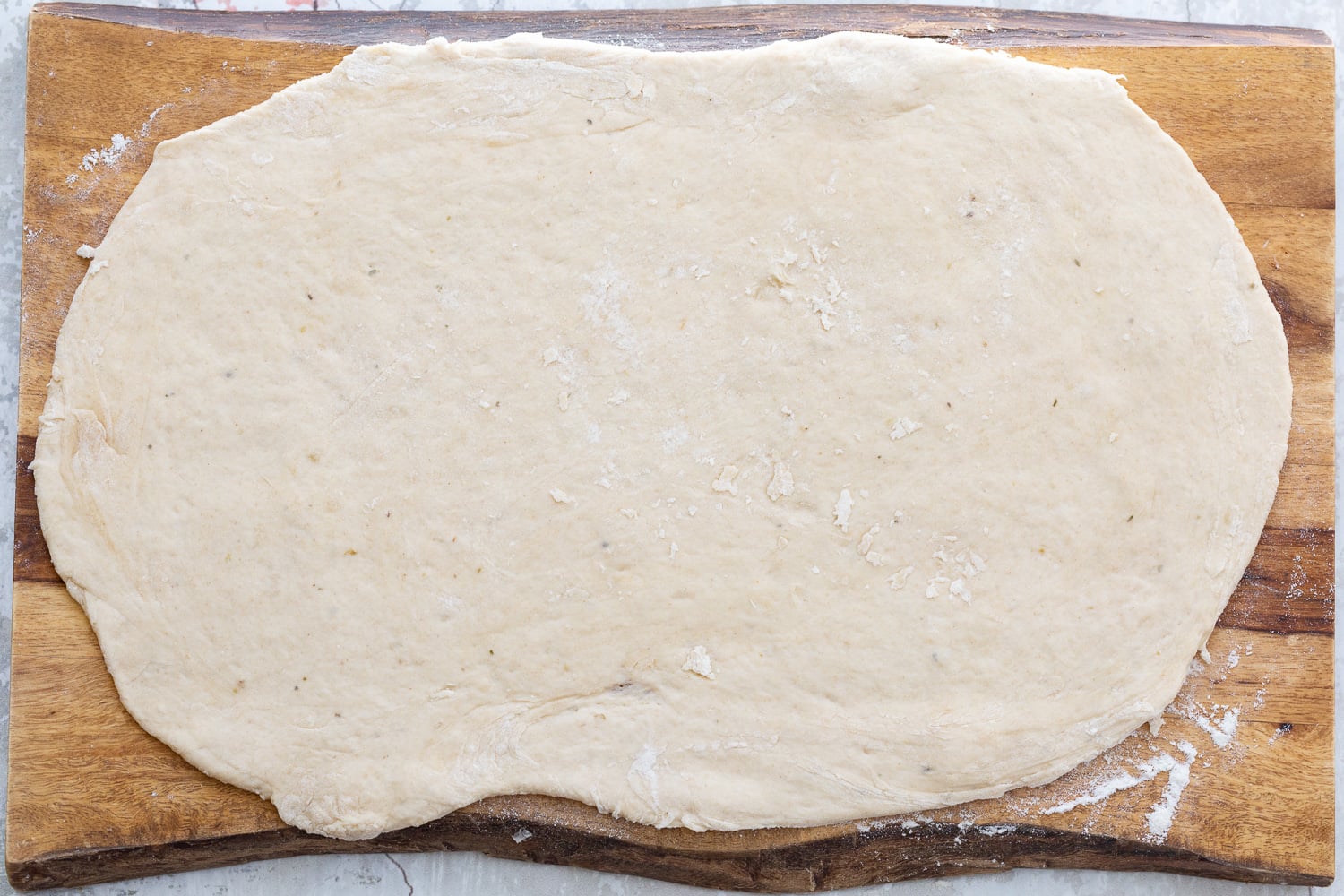 pizza rolls recipe Vegan Pizza rolls dough being rolled out into a rectangle