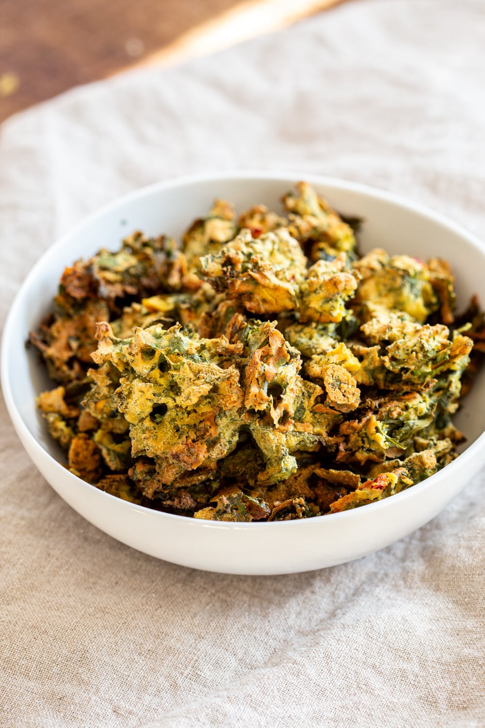 Kale Pakora in a white bowl