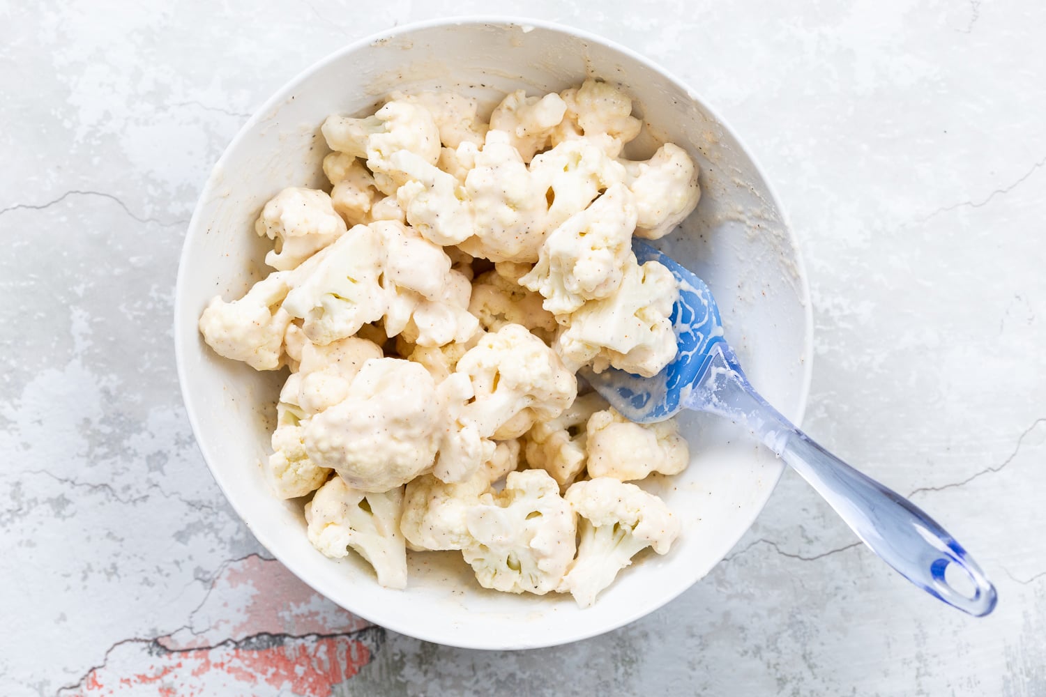 Battered Cauliflower for Our Sticky Sesame Cauliflower in a white bowl