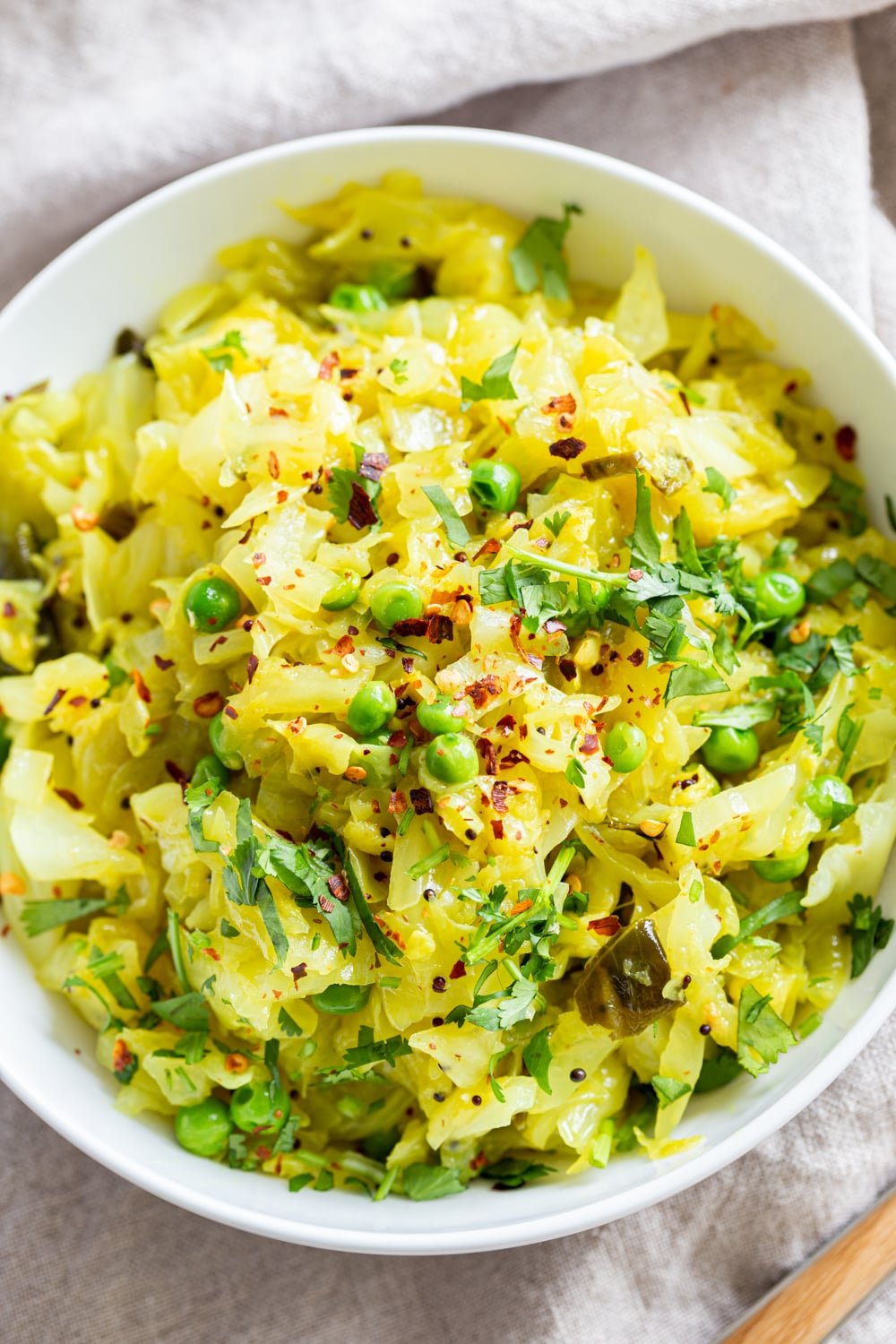 Instant Pot Indian Cabbage and Peas in a white bowl