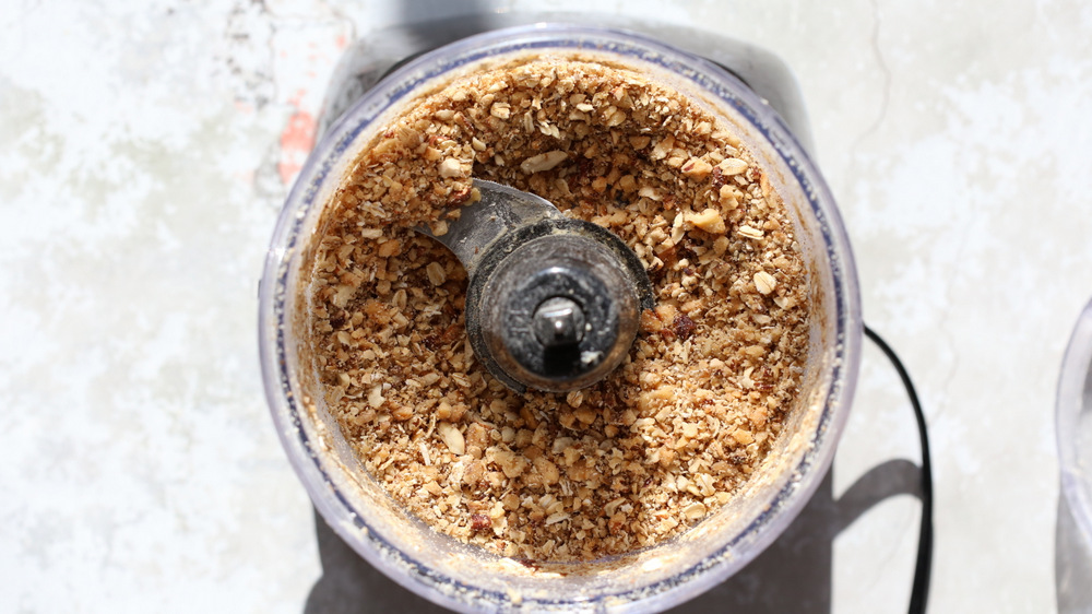 chopped nuts and oats in a small food processor