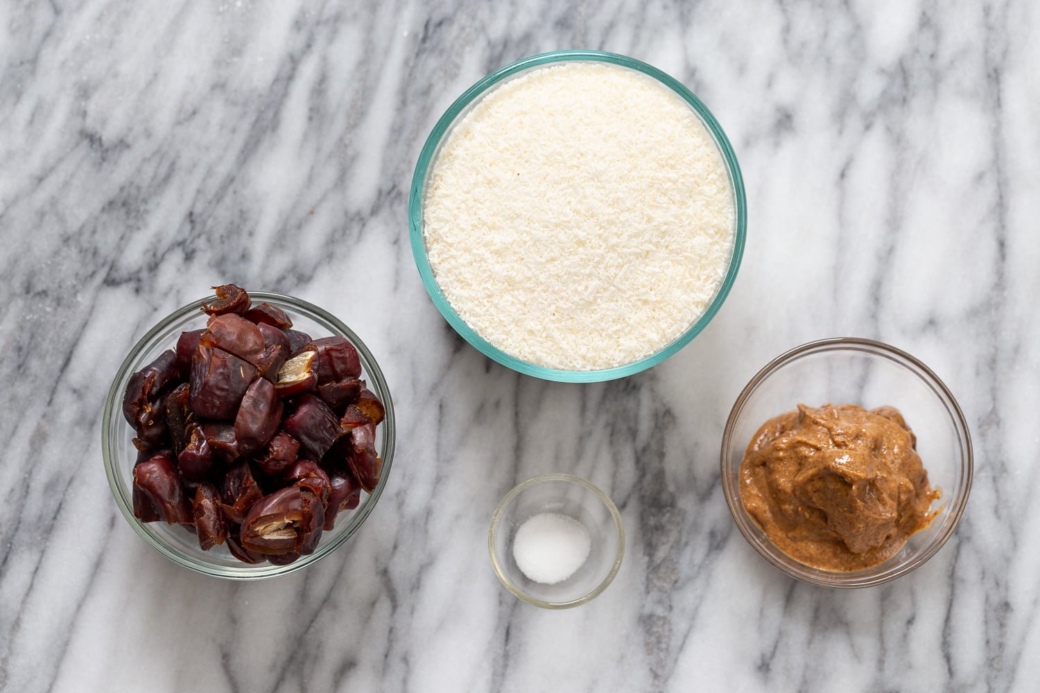 coconut balls overhead shot of ingredients needed for making vegan date coconut balls