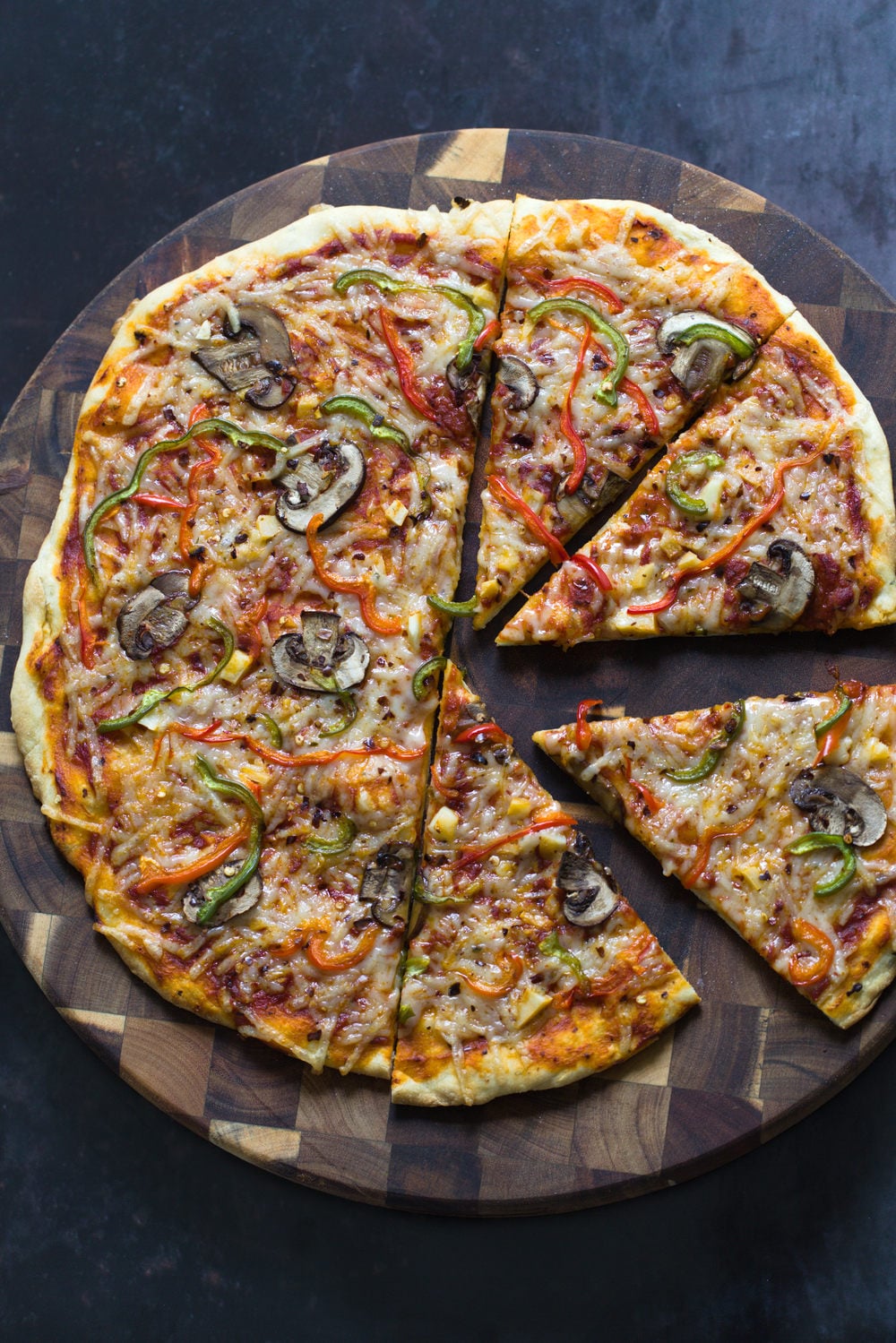 no yeast pizza dough overhead shot of vegan no yeast pizza with vegetable topping