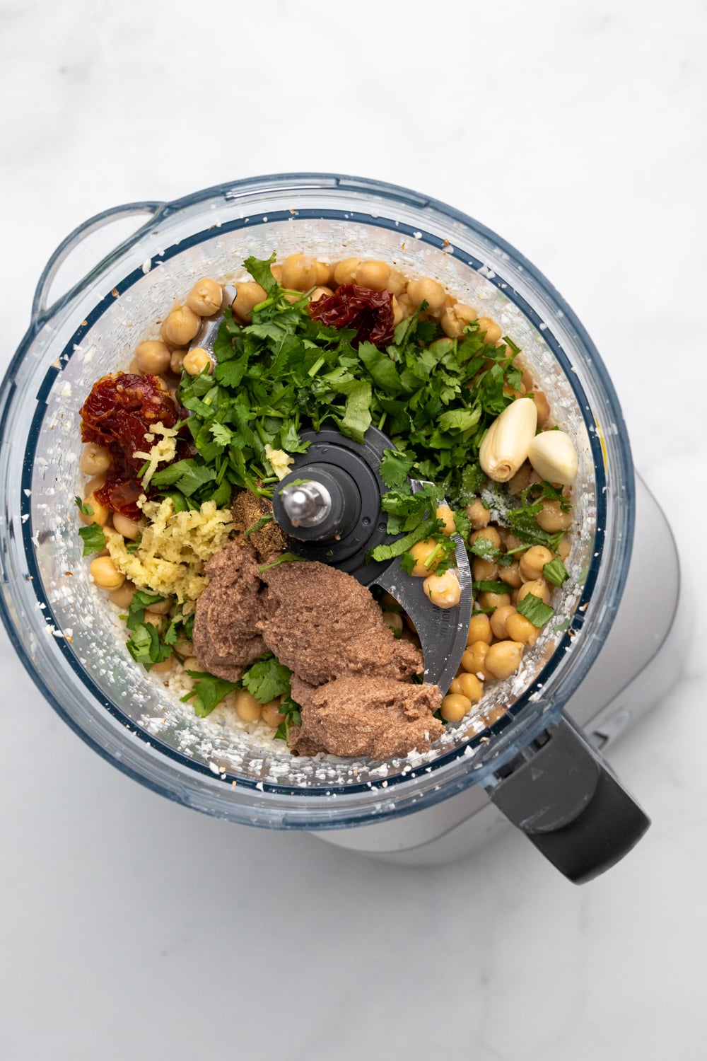 chickpea burger ingredients for making vegan chickpea burger patties in a food processor