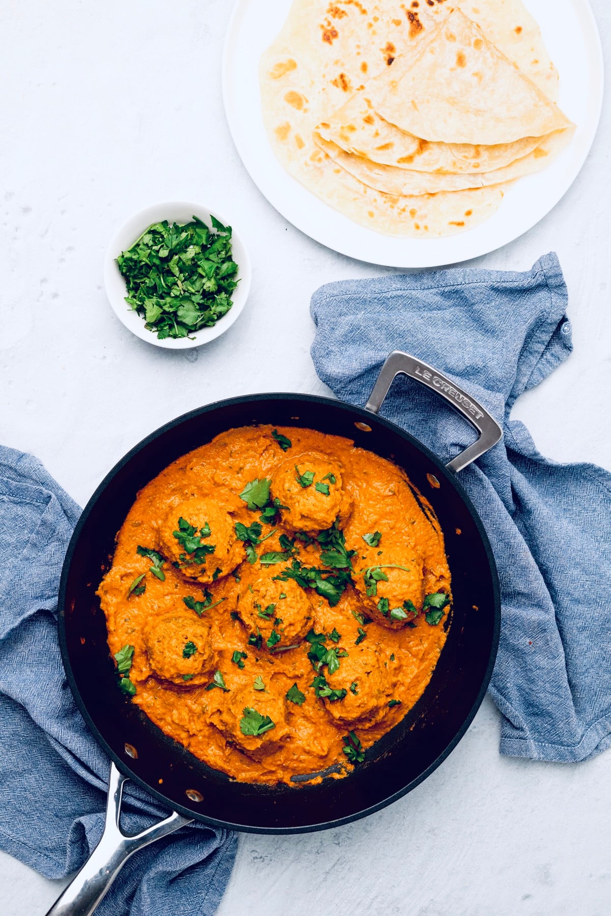 vegan malai kofta overhead shot of vegan malai kofta in a black skillet