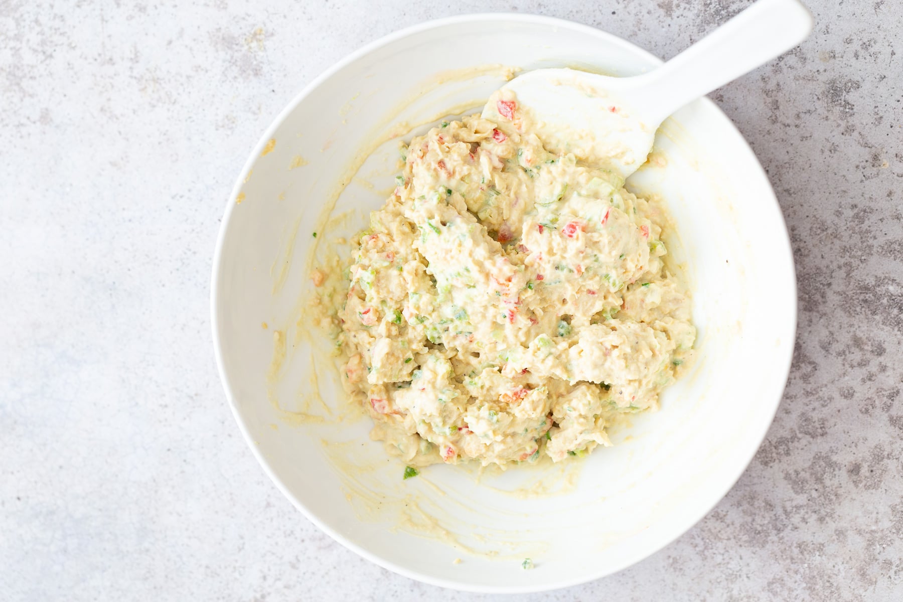 chickpea salad sandwich creamy vegan jalapeño chickpea salad in a white bowl