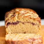 a sliced peanut butter and jelly cake on a cutting board