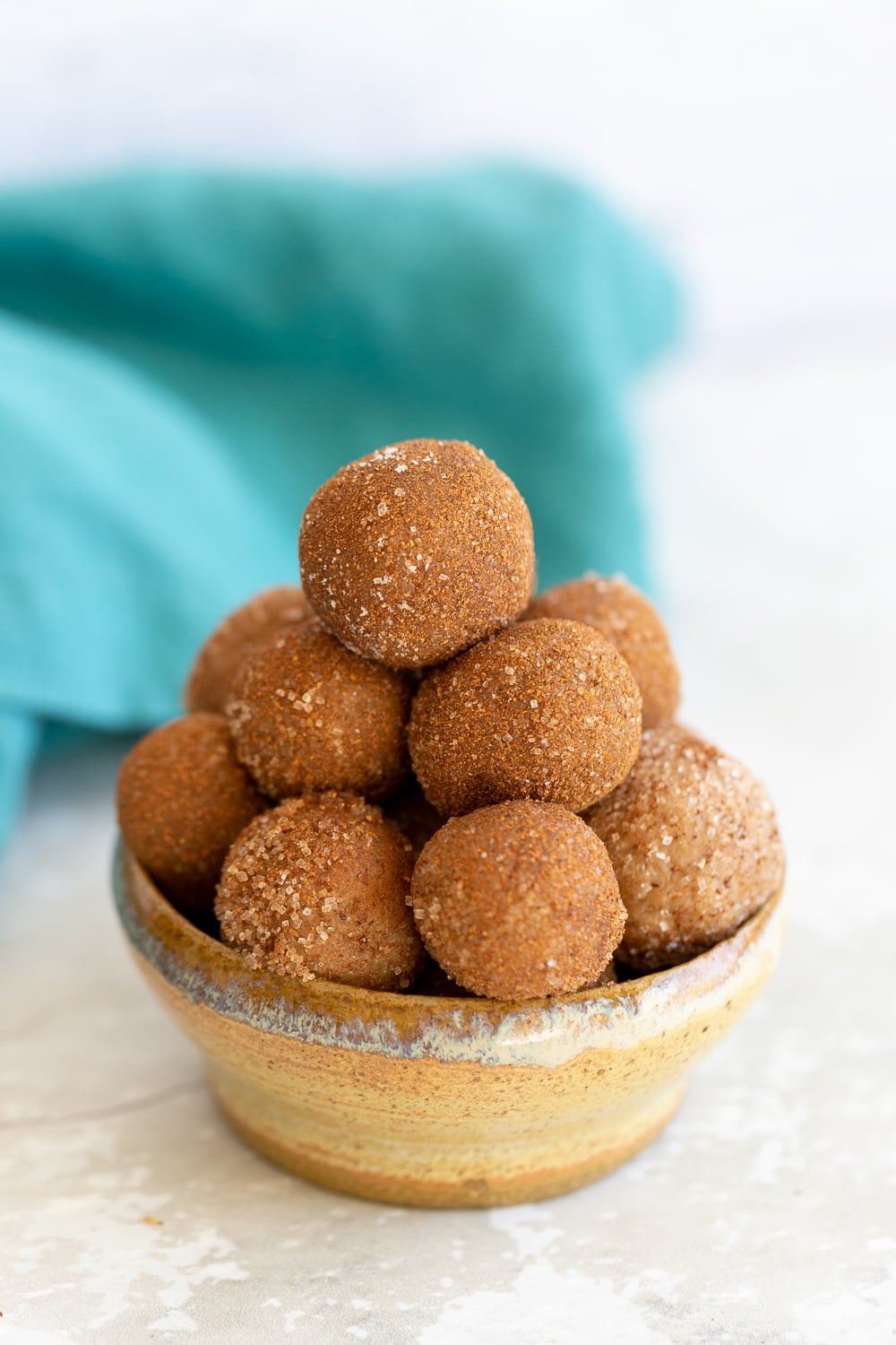 Snickerdoodle Bites Vegan Snickerdoodle Bites in a small clay bowl