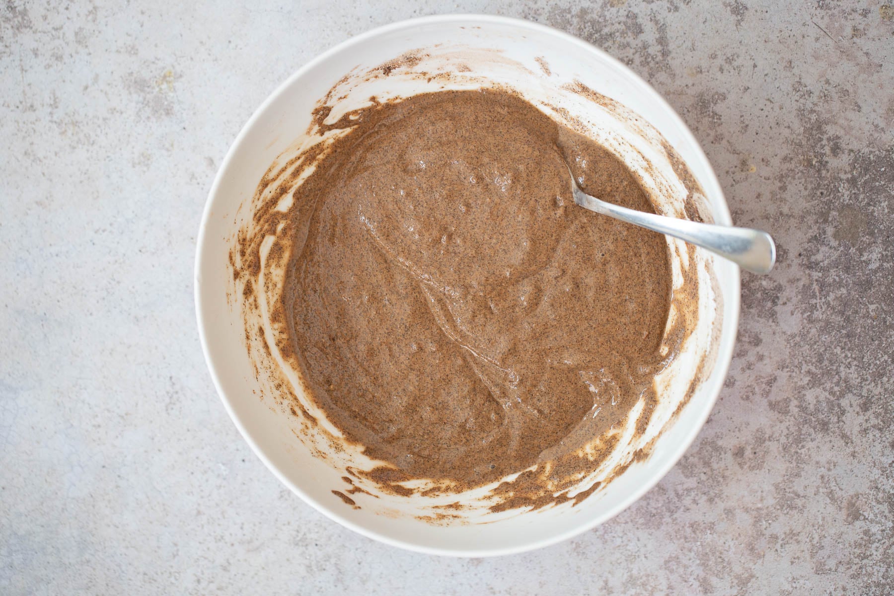 buckwheat waffles chocolate waffle batter in a white bowl