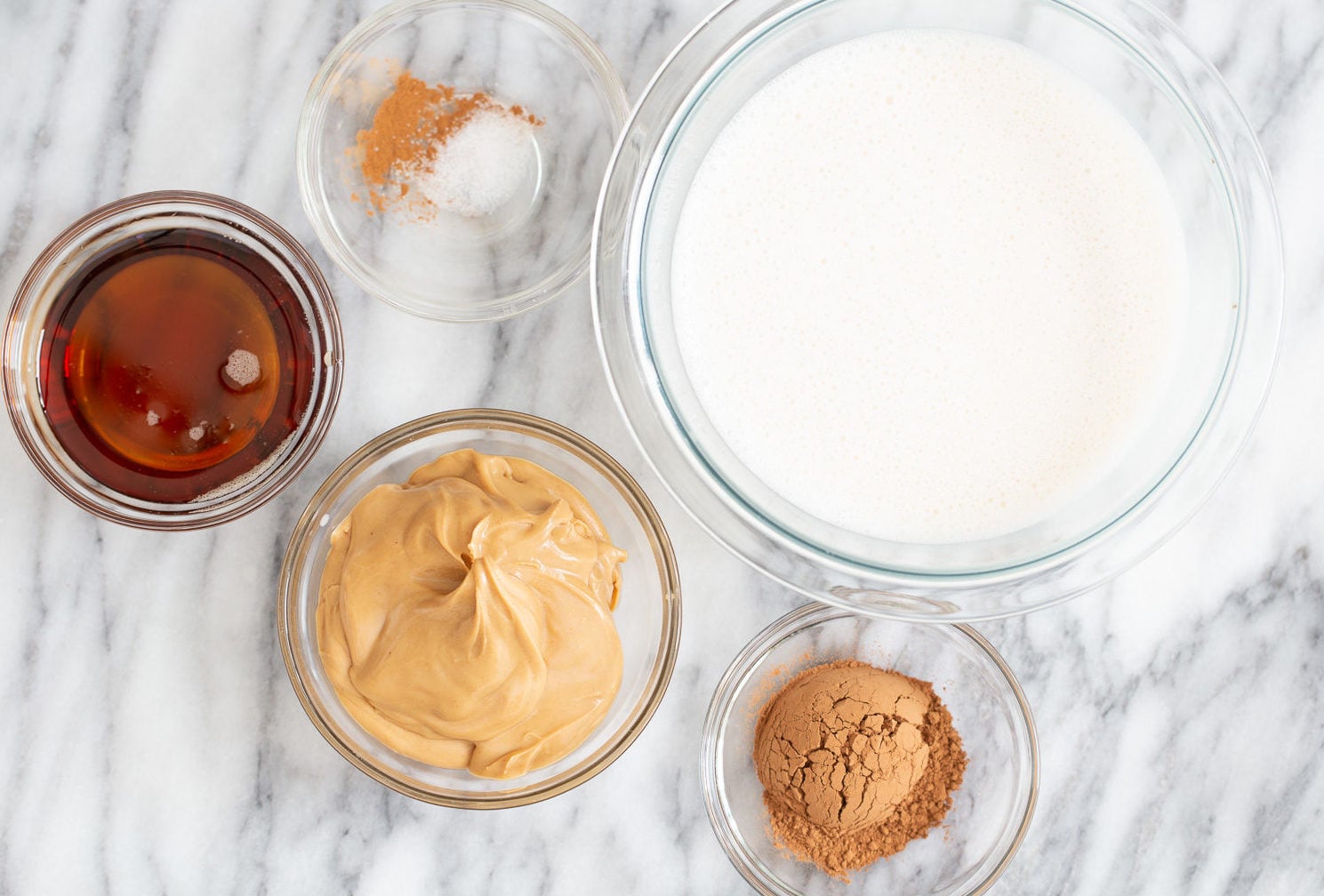 peanut butter mousse Ingredients for vegan peanut butter mousse in bowls